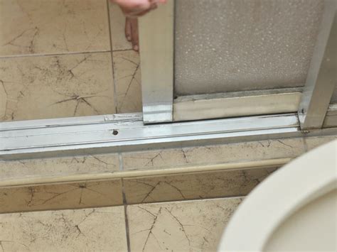 sliding shower door leaks at bottom|How to Fix a Sliding Shower Door: Step